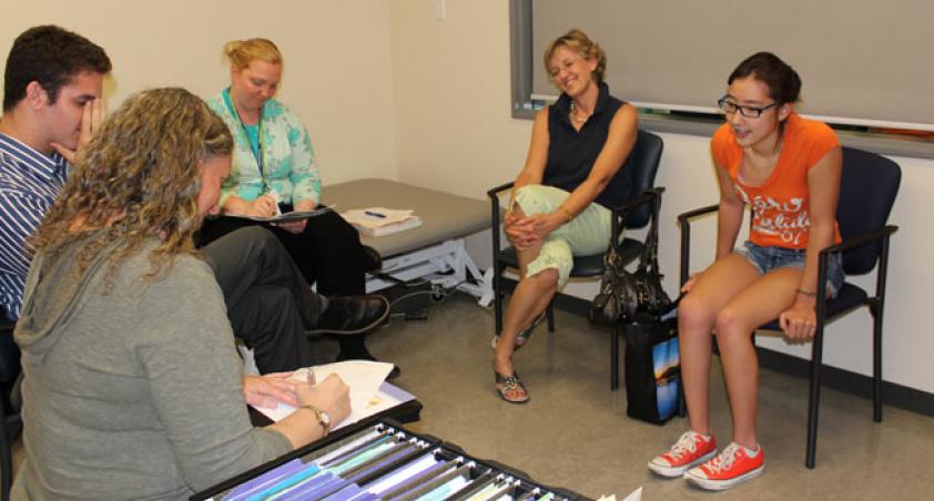 Client and staff discussing the next phase